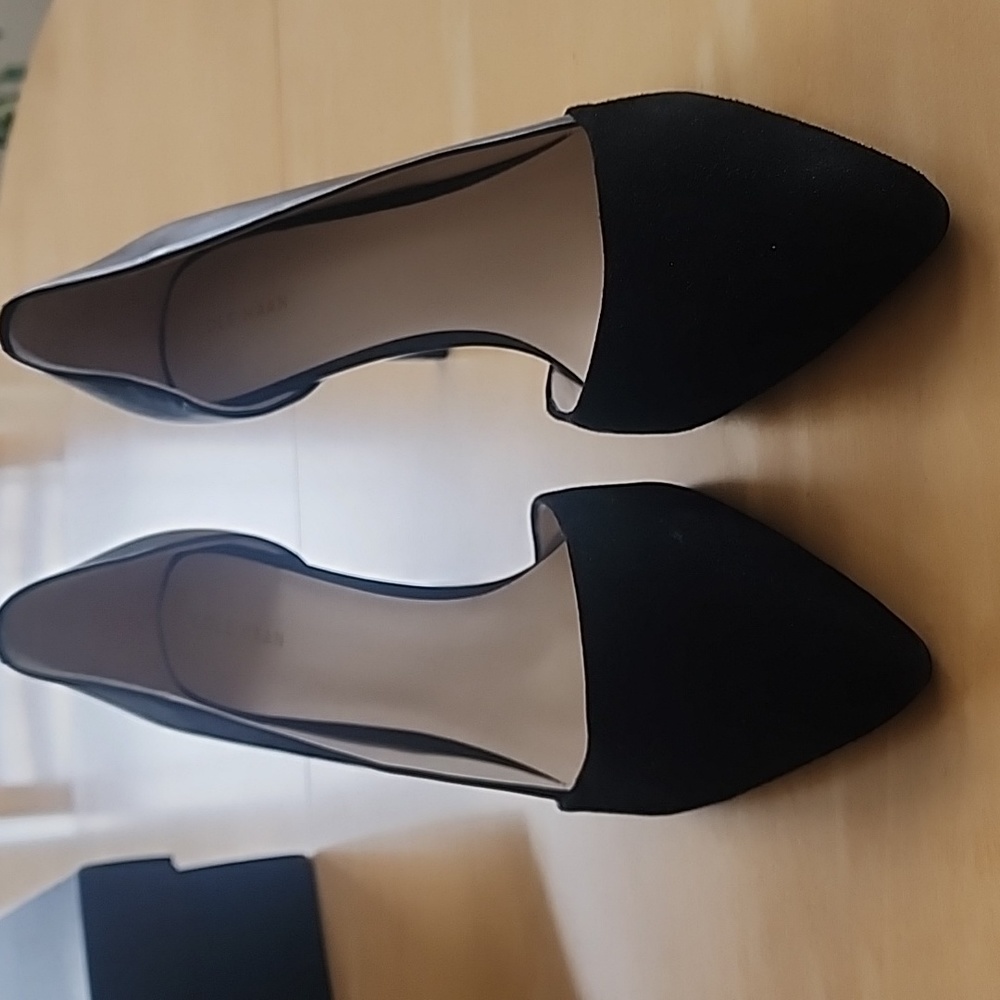 Cole Haan size 9.5 black leather and suede heels.